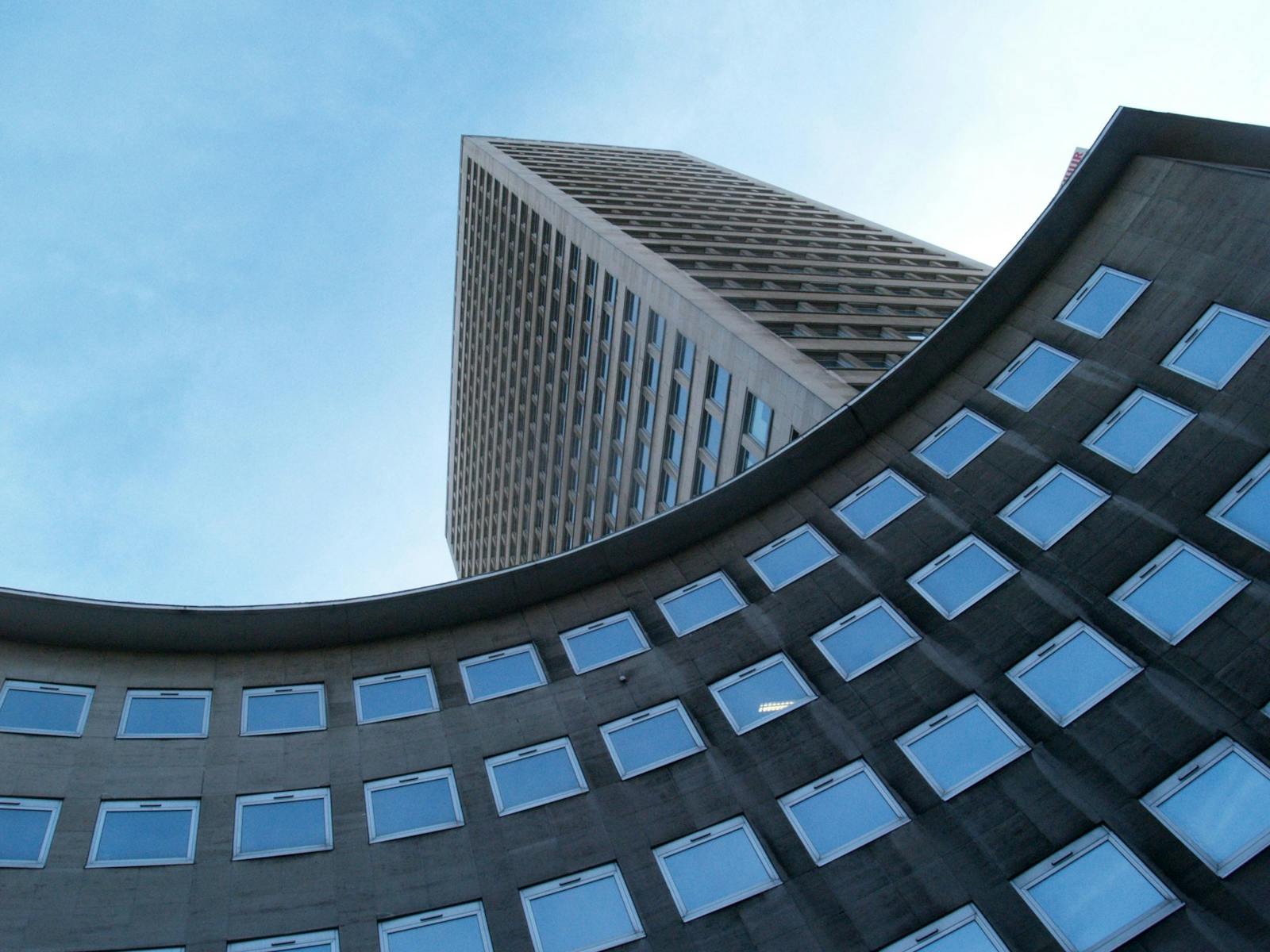 Gray Concrete Building Under Blue Sky